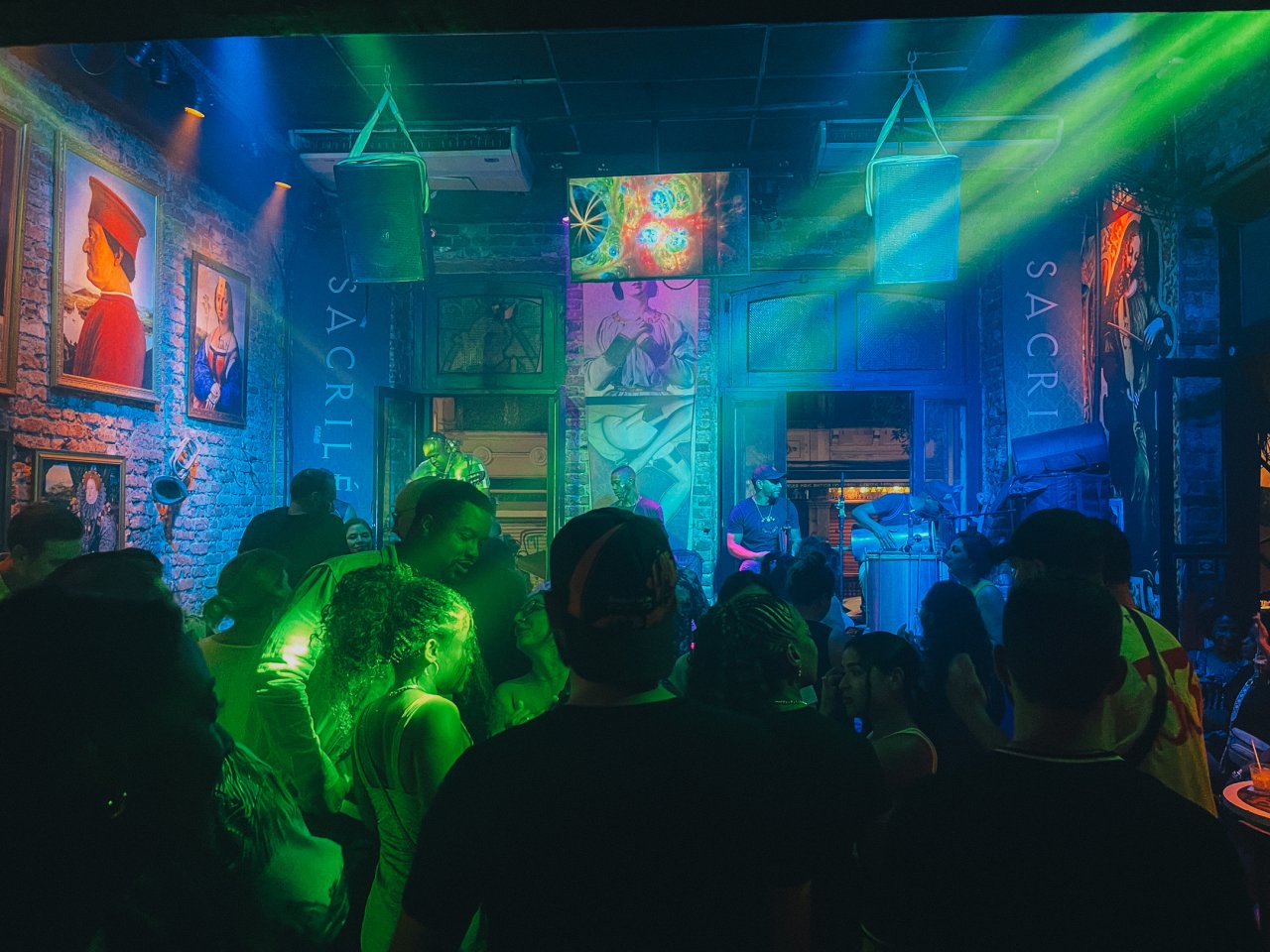 Group of young travellers dancing in a nightclub in Rio in Brazil on a TruTravels tour